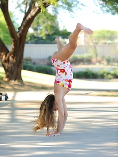 Tara does a flip in the park by FTVGirls