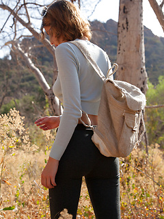 Sweet teen next door April Grantham posing naked in a secluded nature park by Zishy
