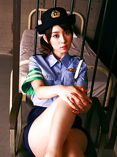 Rina Akiyama Asian in police woman uniform exposes sexy legs by AllGravure