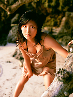 Short haired gravure idol with big boobs wearing a bikini by AllGravure
