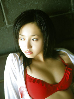 Busty gravure idol with plump boobs wrapped in pink lace lingerie by AllGravure