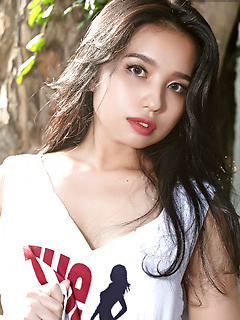 Asian beauty Norah gets totally naked underneath a tree by The Black Alley