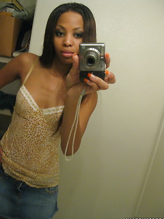 Sexy black girlfriend shows off her perky tits in selfshot mirror pictures her boyfriend uploaded for us by Share My GF