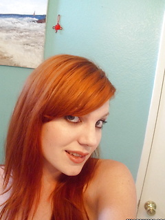 Sexy redhead teen takes selfshot pictures then plays with her cute perky friend by Share My GF
