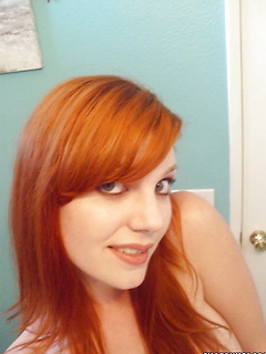 Sexy redhead teen takes selfshot pictures then plays with her cute perky friend by Share My GF