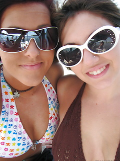 Bunch of girlfriends out on a boat drinking in skimpy bathing suits by Share My GF