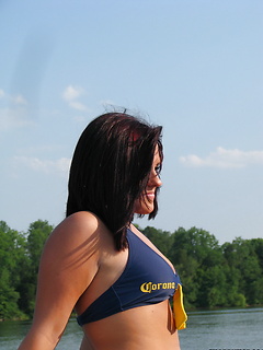 Bunch of girlfriends out on a boat drinking in skimpy bathing suits by Share My GF